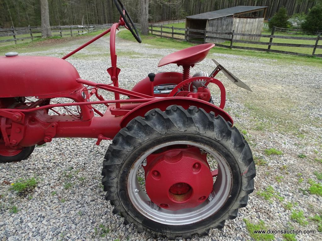 (OUT) 1942 MCCORMICK FARMALL CUB; THIS RED FULLY RESTORED TRACTOR. IT WAS FULLY RESTORED BY THE