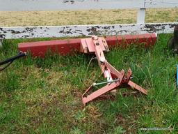 METAL TRACTOR BLADE; FADED RED REAR TRACTOR BLADE ATTACHMENT. MEASURES 72 IN X 13 IN X 46 IN.