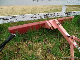 METAL TRACTOR BLADE; FADED RED REAR TRACTOR BLADE ATTACHMENT. MEASURES 72 IN X 13 IN X 46 IN.