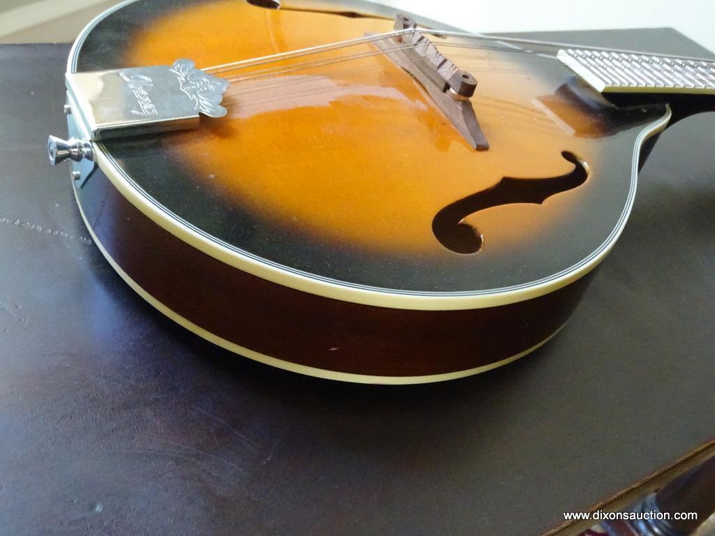 (LR) IBANEZ MANDOLIN; MODEL #M510-BS, SERIAL #2Y-02-GS110202630. 8 STRING, ROUND BODY WITH BROWN