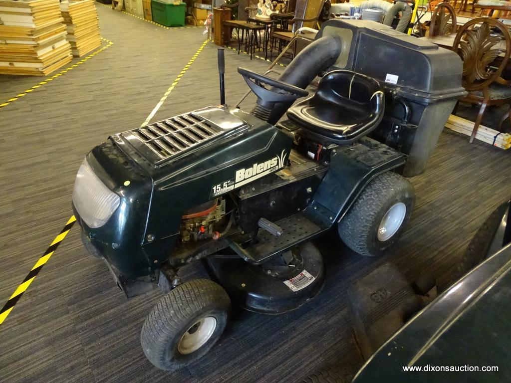 BOLENS LAWN TRACTOR; DARK GREEN IN COLOR BOLENS BY MTD 15.5 HP LAWN TRACTOR. 38 IN CUT, 6 SPEED