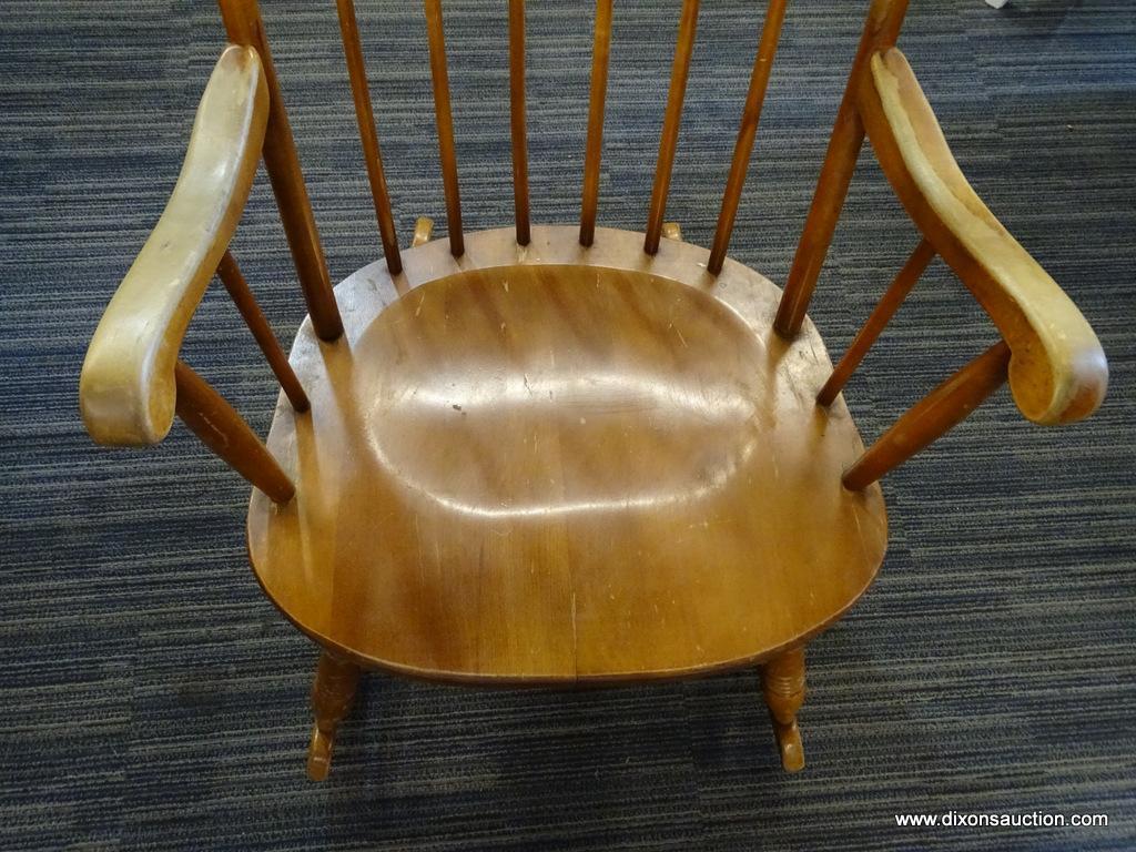 ROCKING CHAIR; MAPLE STRAIGHT BACK AND SPINDLE TURNED LEGGED ROCKING CHAIR. MEASURES 26 IN X 28 IN X