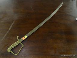 SABRE; HAS A BRASS EAGLE STYLE D-GUARD HANDLE WITH A "N" IN THE CENTER OF THE HANDLE. HANDLE