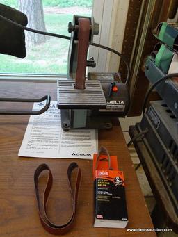 (WSHOP) DELTA 1 IN BELT SANDER; MODEL 31-050. IS IN GOOD USED CONDITION AND WOULD BE GREAT FOR ANY