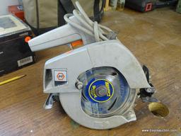 (WSHOP) BLACK & DECKER CIRCULAR SAW; IS 7-1/4 IN DIA. IN GOOD USED CONDITION. MODEL 7301. 120 VOLTS