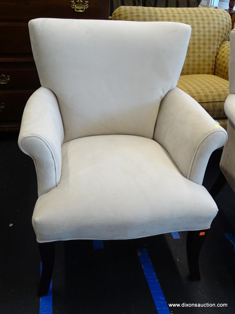 UPHOLSTERED ARM CHAIR; 1 OF A PAIR OF CREAM UPHOLSTERED ARM CHAIRS WITH MAHOGANY LEGS. VERY CLEAN