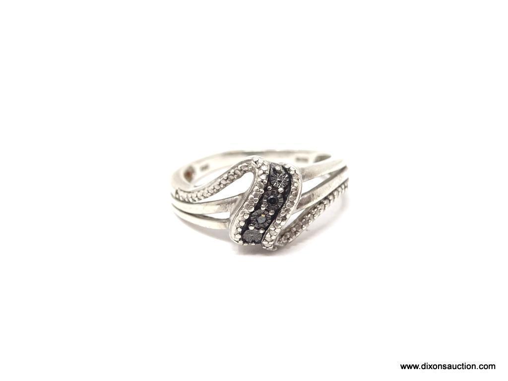 LADIES .925 STERLING SILVER BLACK DIAMOND RING. RING SIZE 7.