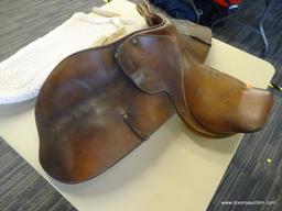 CROSBY 16 IN LEATHER HORSE SADDLE; IS DARK BROWN IN COLOR AND INCLUDES A SADDLE PAD.