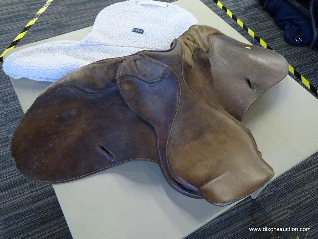 CROSBY 17 IN LEATHER HORSE SADDLE; IS BROWN IN COLOR. INCLUDES A SADDLE PAD.