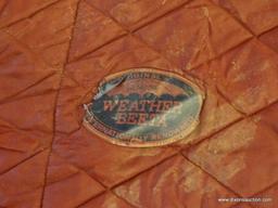 GENUINE WEATHERBEETA WATERPROOF HORSE BLANKET; IS BURGUNDY AND BLUE IN COLOR. MEASURES APPROXIMATELY