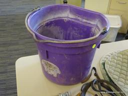 HORSE FEED BUCKET WITH ASSORTED CONTENTS; FLAT BACK 20 QT BUCKET. IS BLACK IN COLOR. INCLUDES