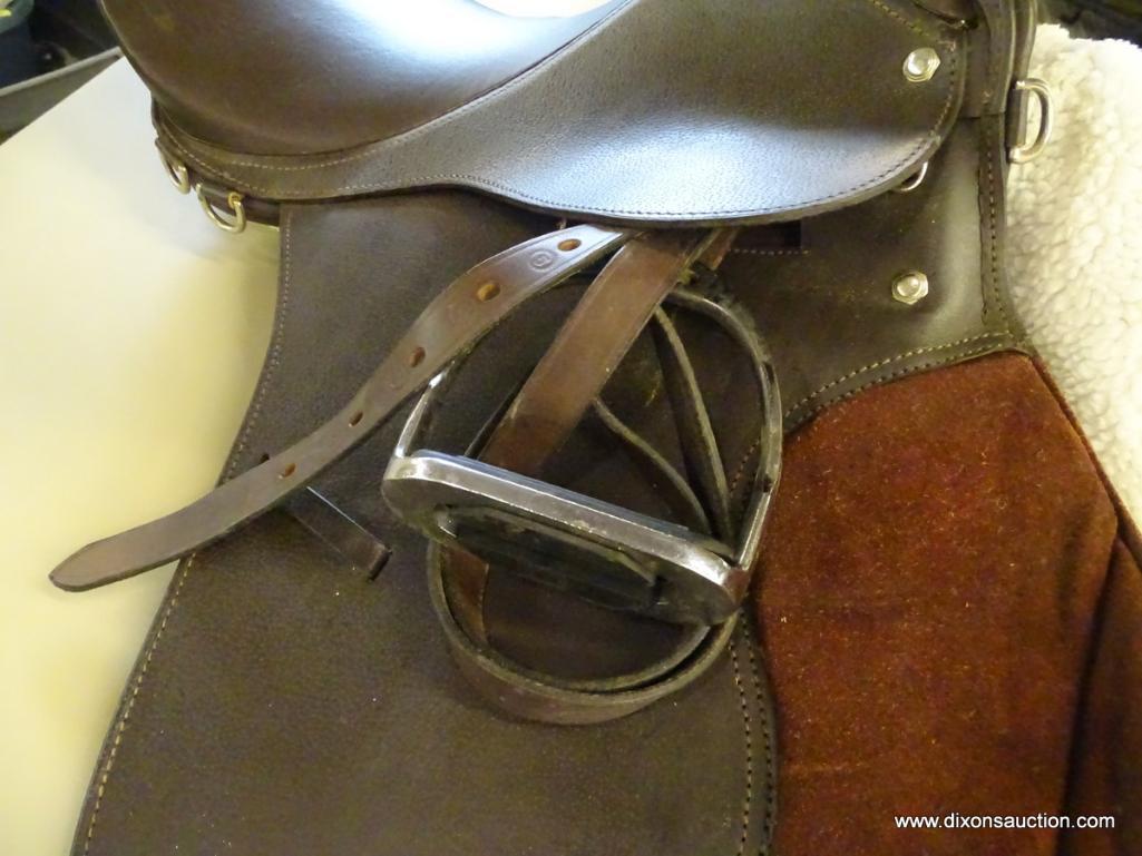 LEATHER 18 1/2 IN HORSE SADDLE; COMES WITH A FLEECE SADDLE PAD WITH SUEDE DETAILING. IS DARK BROWN