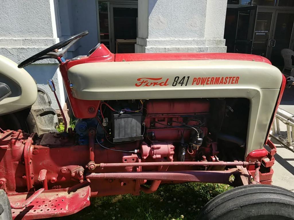 FORD 841 POWERMASTER TRACTOR; FOUR SPEED FORD 2.8L 4-CYCLE GASOLINE ENGINE. RED & WHITE IN COLOR.