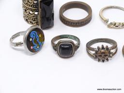 LOT OF ASSORTED COSTUME RINGS; LOT INCLUDES 11 SILVER TONED RINGS. SIZES 5 3/4- 9 1/2.