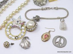 LOT OF ASSORTED COSTUME JEWELRY; LOT INCLUDES A FAUX PEARL NECKLACE, 2 SILVER TONED CHAINS, A SILVER