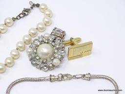 LOT OF ASSORTED COSTUME JEWELRY; LOT INCLUDES A FAUX PEARL NECKLACE, 2 SILVER TONED CHAINS, A SILVER