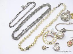 LOT OF ASSORTED COSTUME JEWELRY; LOT INCLUDES A FAUX PEARL NECKLACE, 2 SILVER TONED CHAINS, A SILVER