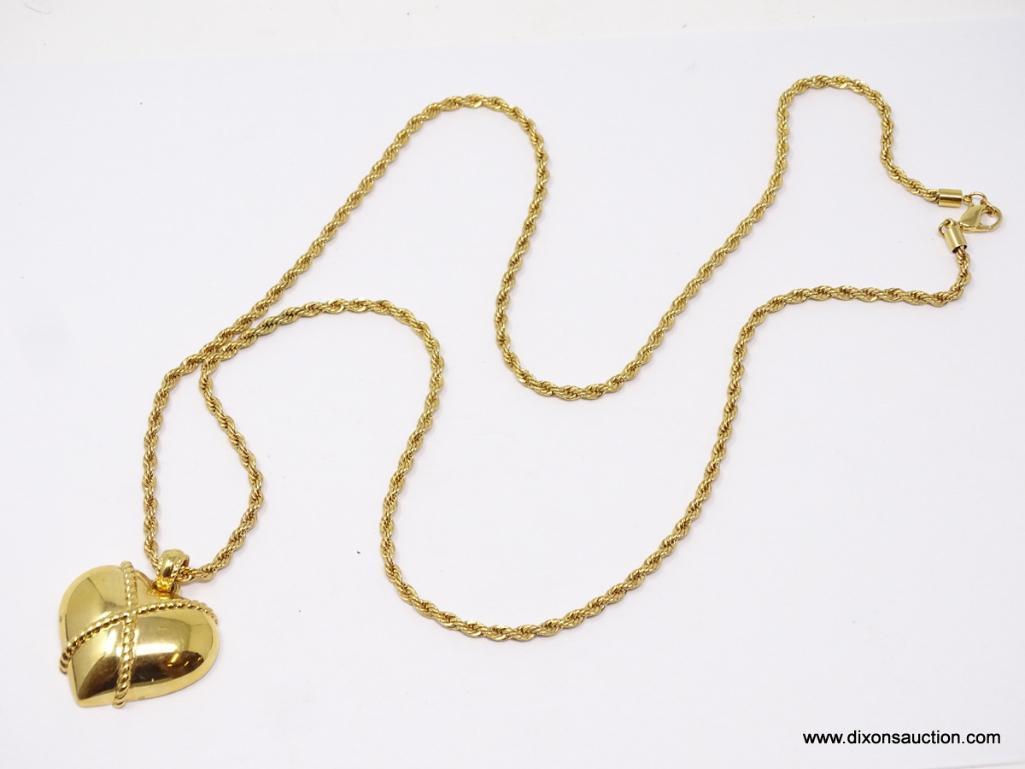 LADIES MONET GOLD TONE CHAIN WITH PENDANT; 36 IN GOLD TONE ROPE STYLE CHAIN WITH LARGE HEART SHAPED