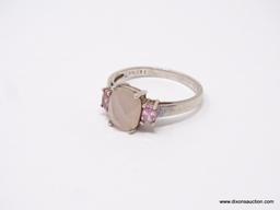 LADIES .925 STERLING SILVER RING; LARGE PINK CENTER GEMSTONE WITH PINK STONE ON EACH SIDE. SIZE 11.