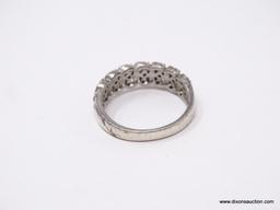 LADIES .925 STERLING SILVER RING; STERLING SILVER RING WITH 8 ROWS OF 3 CLEAR STONES IN EACH. SIZE 9