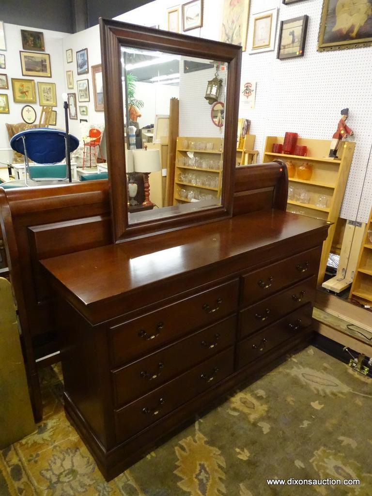 WOODEN MIRRORED DRESSER; RECTANGULAR FRAMED BEVELED MIRROR SITTING ON A RICH WOODEN DRESSER WITH 6