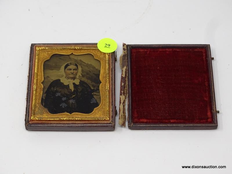 ANTIQUE TINTYPE; SIXTH PLATE SIZE AND IS TITLED "OLD WOMAN WITH SCENIC BACKGROUND". IS IN EXCELLENT