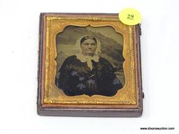 ANTIQUE TINTYPE; SIXTH PLATE SIZE AND IS TITLED "OLD WOMAN WITH SCENIC BACKGROUND". IS IN EXCELLENT