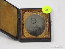 ANTIQUE TINTYPE; NINTH PLATE SIZE AND IS TITLED "CHILD IN LIGHT DRESS". IS IN EXCELLENT CONDITION.