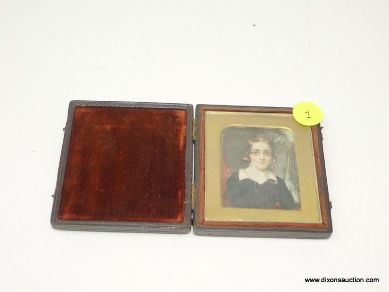 ANTIQUE IVORY PAINTED PHOTO; MEASURES 2.5" X 3" AND IS TITLED "GIRL HAND PAINTED ON IVORY". IS IN