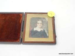 ANTIQUE IVORY PAINTED PHOTO; MEASURES 2.5" X 3" AND IS TITLED "GIRL HAND PAINTED ON IVORY". IS IN