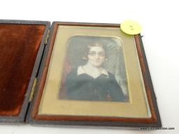 ANTIQUE IVORY PAINTED PHOTO; MEASURES 2.5" X 3" AND IS TITLED "GIRL HAND PAINTED ON IVORY". IS IN