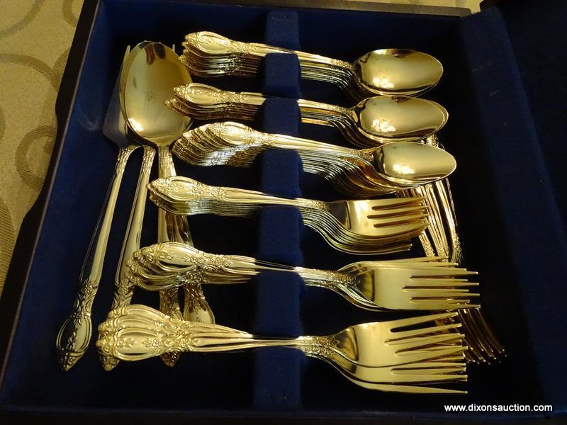 (DR) FLATWARE IN CASE; 84 PCS OF INTERNATIONAL GOLD TONED STAINLESS STEEL FLATWARE IN FLORAL PATTERN