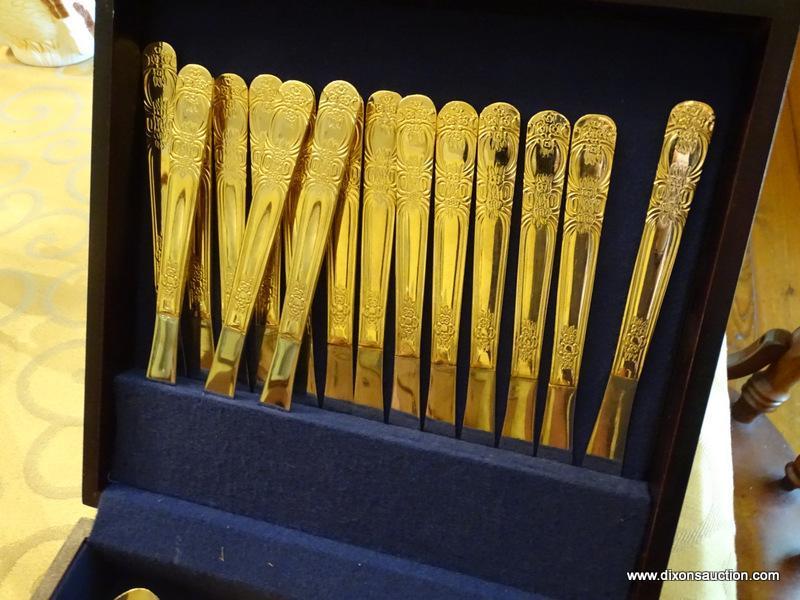 (DR) FLATWARE IN CASE; 84 PCS OF INTERNATIONAL GOLD TONED STAINLESS STEEL FLATWARE IN FLORAL PATTERN