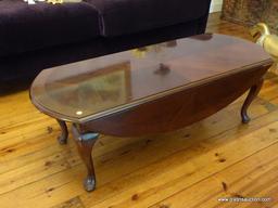 (LR) COFFEE TABLE; OVAL MAHOGANY DROPSIDE TABLE WITH QUEEN ANNE FEET AND A 2 IN BANDING AROUND THE