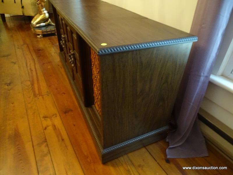 (LR) SEARS STEREO CABINET; HAS AM/FM/TURNTABLE/8-TRACK PLAYING CAPABILITIES. IS IN GOOD WORKING