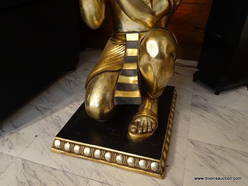(FAM) EGYPTIAN FIGURAL TABLE; GOLD TONED AND BLACK PAINTED KNEELING EGYPTIAN FIGURAL BUTLERS TABLE