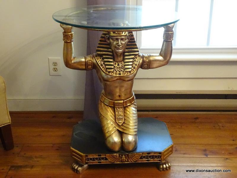 (LR) EGYPTIAN FIGURAL TABLE; 1 OF A PAIR OF GOLD TONED AND BLACK PAINTED KNEELING EGYPTIAN FIGURAL