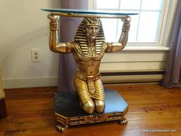 (LR) EGYPTIAN FIGURAL TABLE; 1 OF A PAIR OF GOLD TONED AND BLACK PAINTED KNEELING EGYPTIAN FIGURAL