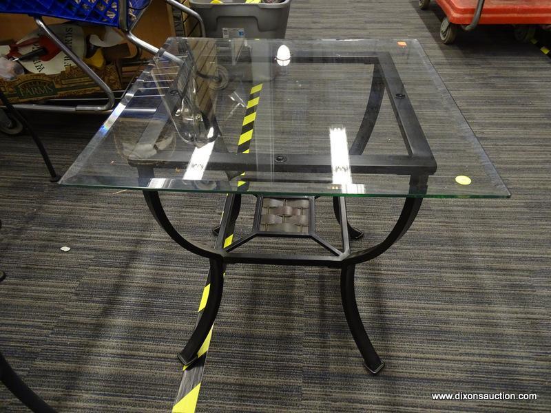 GLASS TOP SIDE TABLE; SQUARE BEVELED GLASS TOP SITTING ON A BLACK METAL BASE WITH A MARBLED-LOOK