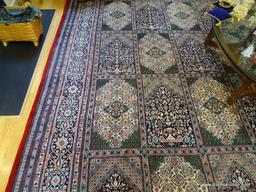 (LR) ORIENTAL RUG; HAND WOVEN KASHAN ORIENTAL RUG IN RED, GREEN AND IVORY GEOMETRIC PATTERNED