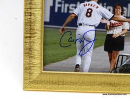 CAL RIPKEN AUTOGRAPHED FRAME; CAL RIPKEN AUTOGRAPHED FRAMED PHOTO; COMES IN GOLD TONED FRAME WITH