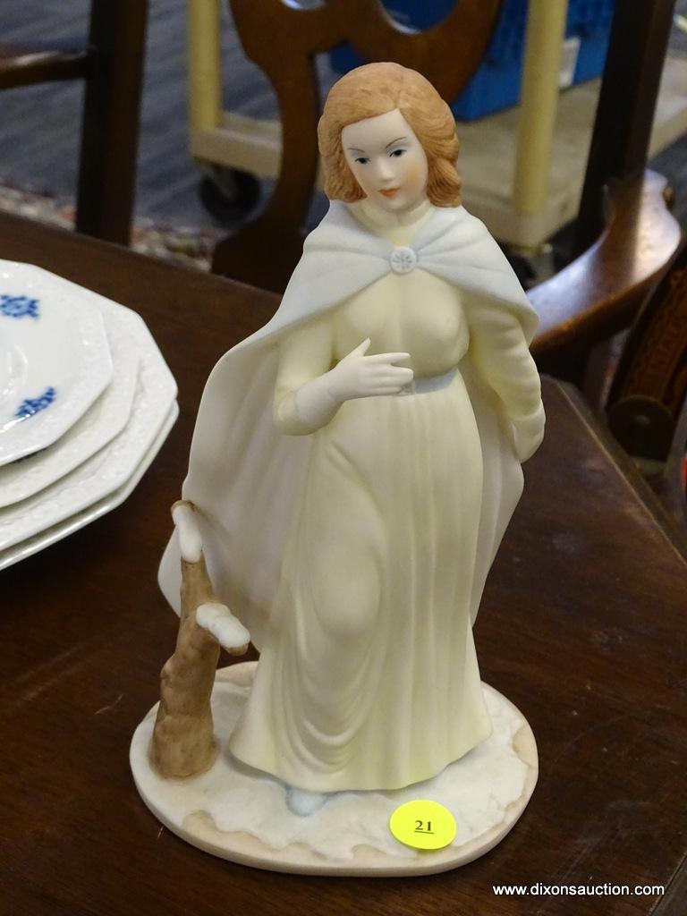 LASZLO ISPANKY FOUR SEASONS FIGURINE; WINTER LADY FOUR SEASONS FIGURINE FINE PORCELAIN. MEASURES 9