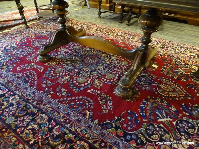 GENUINE HAND KNOTTED ORIENTAL RUG; 100% WOOL HAND KNOTTED MASHAD RUG. RED FIELD COLOR WITH A NAVY