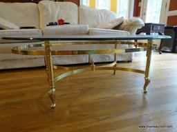 (LR) COFFEE TABLE; BRASS AND BEVELED GLASS TOP COFFEE TABLE- 49 IN X 28 IN X 17 IN