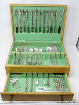 84 PIECES OF INTERNATIONAL STERLING FLATWARE; ANGELIQUE PATTERN. (12) STERLING HANDLED STAINLESS