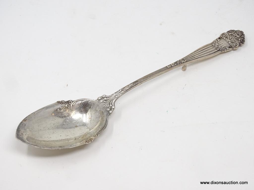 HEAVY STERLING SILVER EMBOSSED & MONOGRAMMED SERVING SPOON; HAS BUILT IN REST ON THE BOTTOM. MARKED
