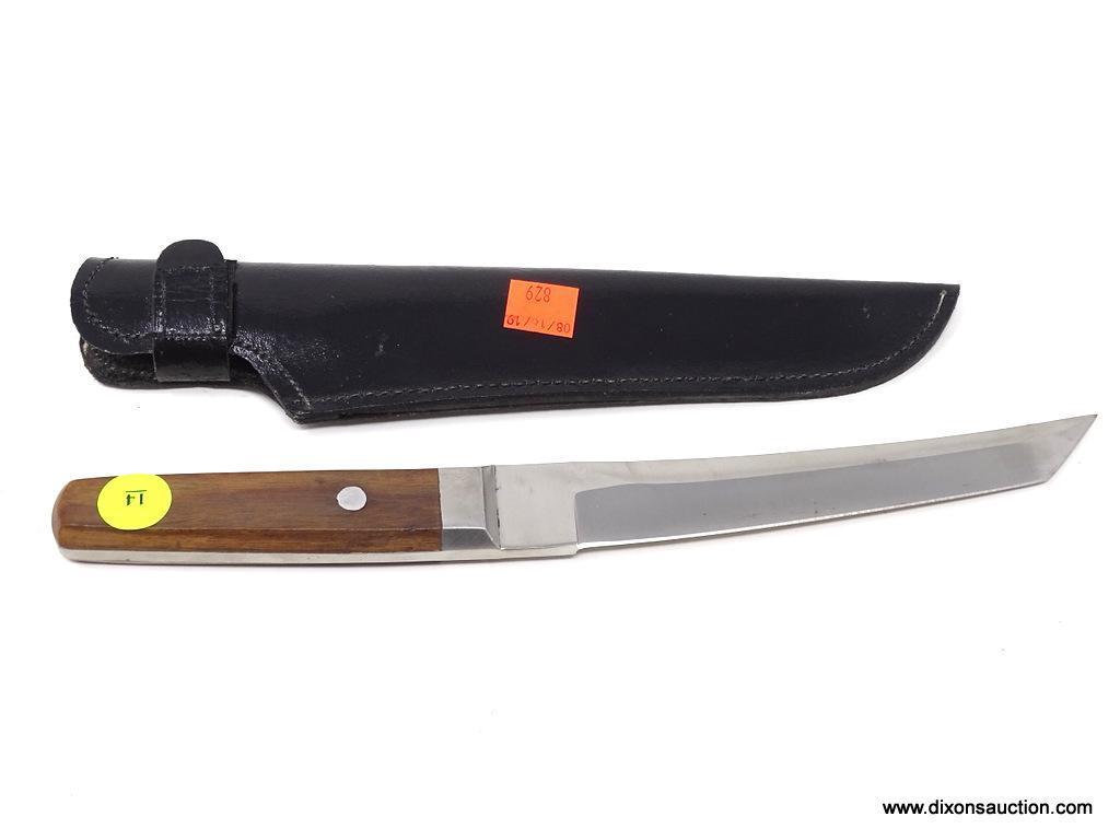 LARGE POCKET KNIFE; LARGE PAKISTAN POCKET KNIFE IN A BLACK LEATHER SHEATH. MEASURES 12 IN.