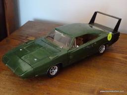 (LR) DODGE CHARGER DAYTONA 1969 MODEL CAR; 1969 DODGE DAYTONA CHARGER GREEN IN 1:18 SCALE BY AUTO