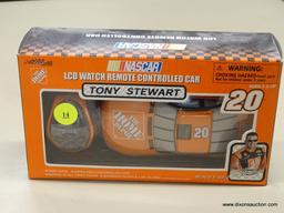 NASCAR REMOTE CONTROLLED CAR; ROUSH RACING, NASCAR'S TONY STEWART #20 LCD WATCH REMOTE CONTROLLED