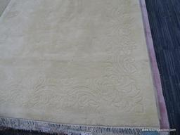 HAND WOVEN RUG; 100% VIRGIN WOOL PILE CHAMPAGNE COLORED GENUINE JINJAK RUG. HAND WOVEN IN INDIA. HAS